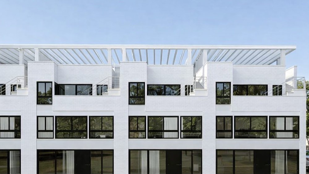 “The SAMO IX” — front elevation with rooftop pergola decks